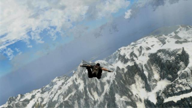 Skydiving in the snowy mountains